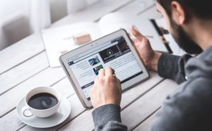 man holding tablet